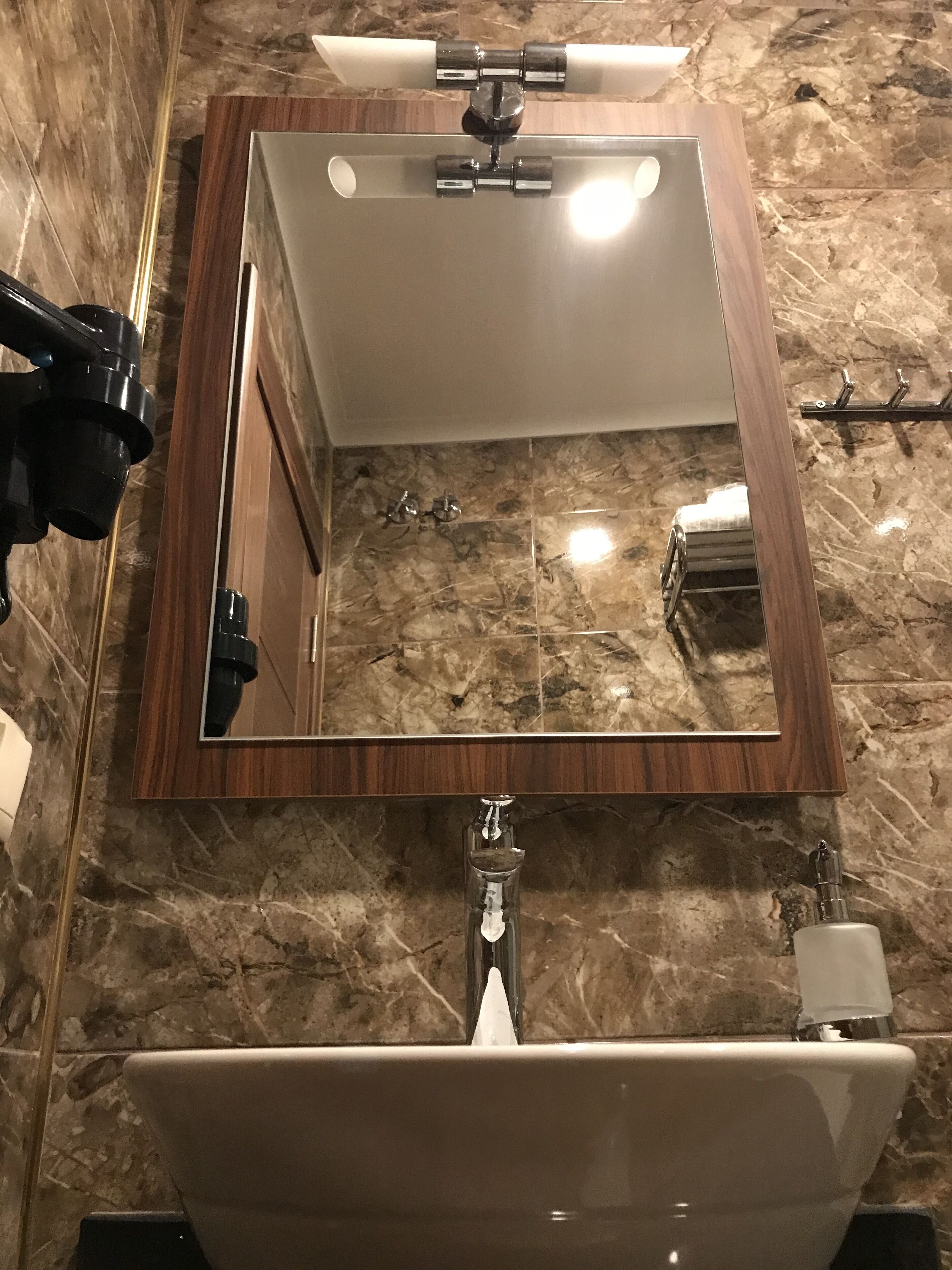 economy room | bathroom | shower, rainfall showerhead, hair dryer, slippers