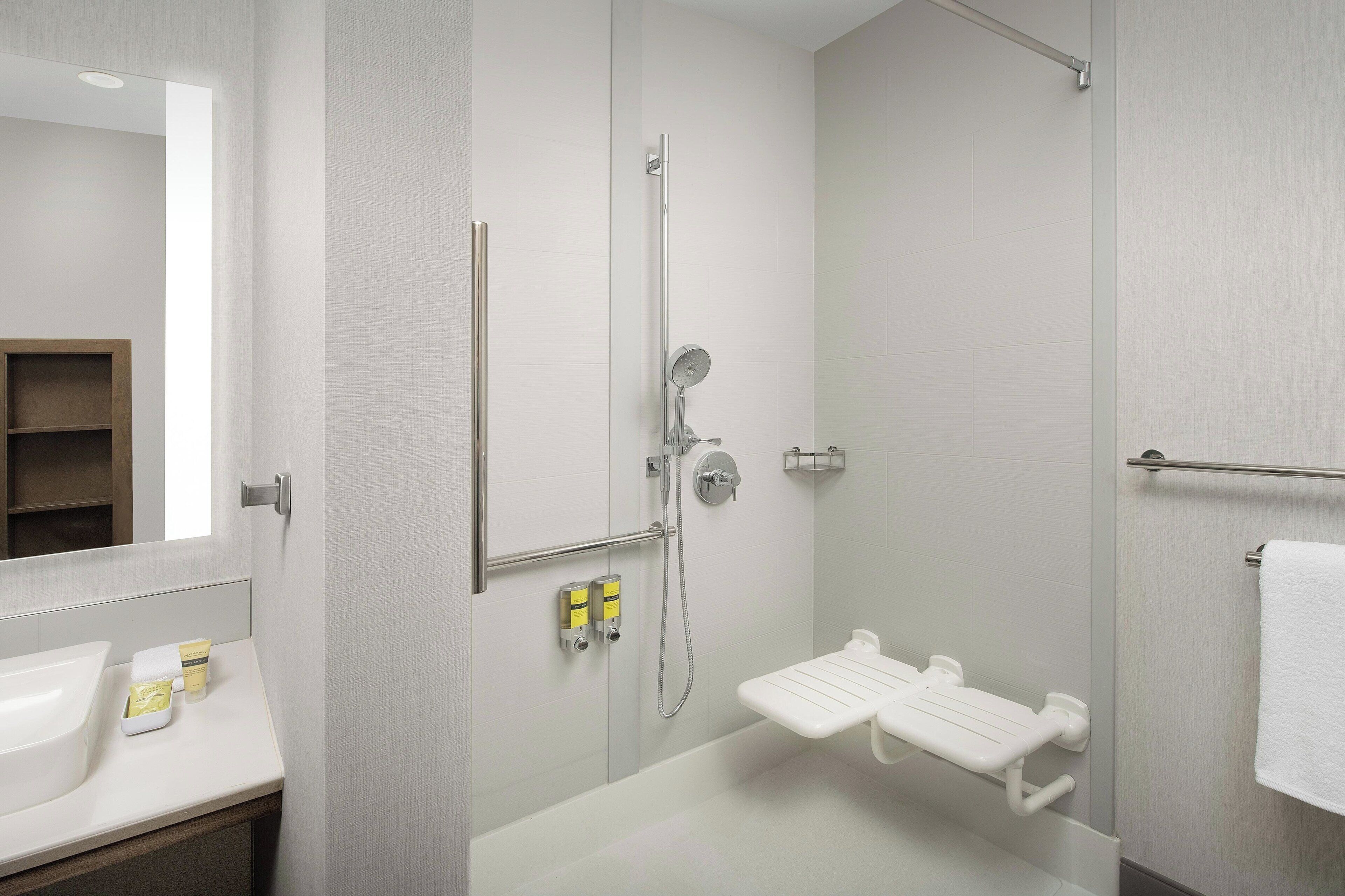 eco-friendly toiletries, hair dryer, towels, soap