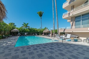 A heated pool, pool loungers