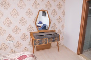 Premium bedding, laptop workspace, free WiFi, bed sheets