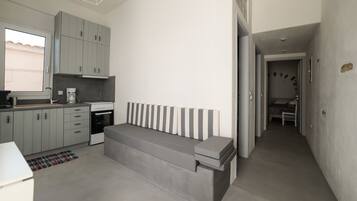 Apartemen Deluks | Dapur pribadi | Lemari es besar, oven, kompor, dan mesin pembuat kopi/teh