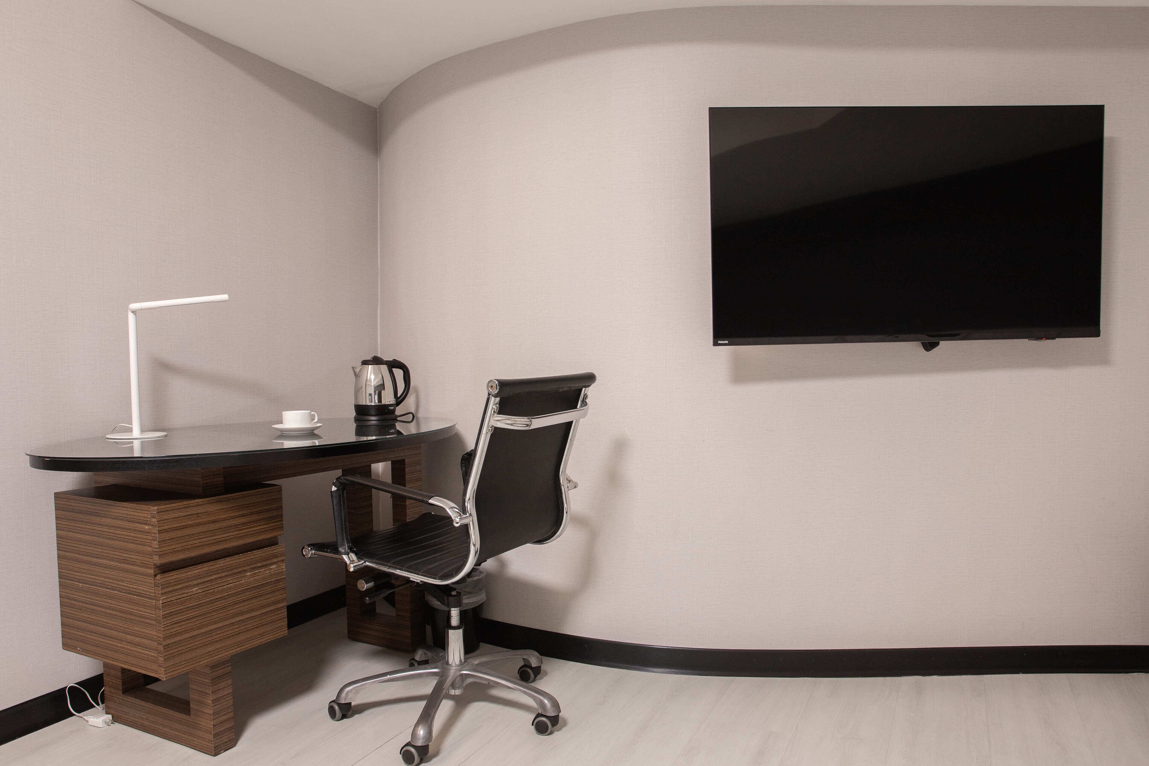 executive quadruple room | in-room safe, desk, blackout curtains, free wifi