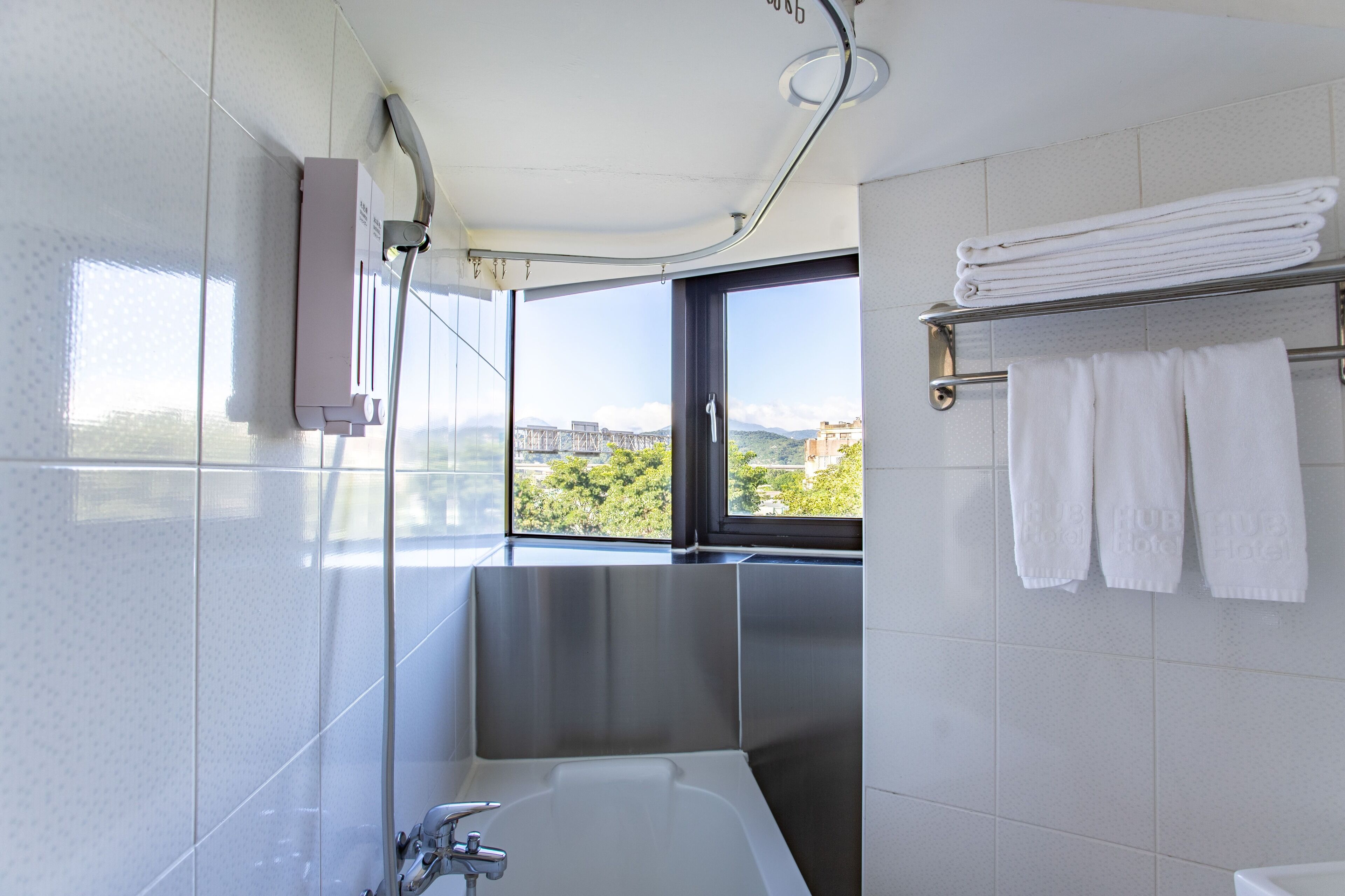 panoramic triple room | bathroom | combined shower/bathtub, hair dryer, slippers, towels