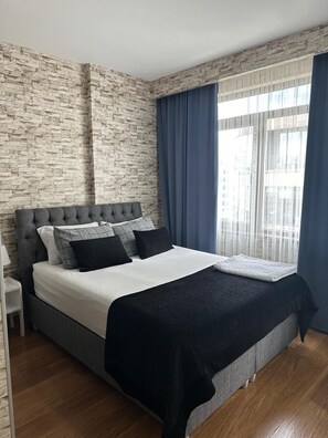 Chambre Deluxe | Draps en coton égyptien, literie de qualité, bureau