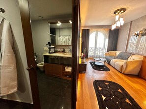 Chambre Exécutive, 1 chambre, baignoire à jets | Salle de bain | Douche, sèche-cheveux, chaussons, serviettes fournies