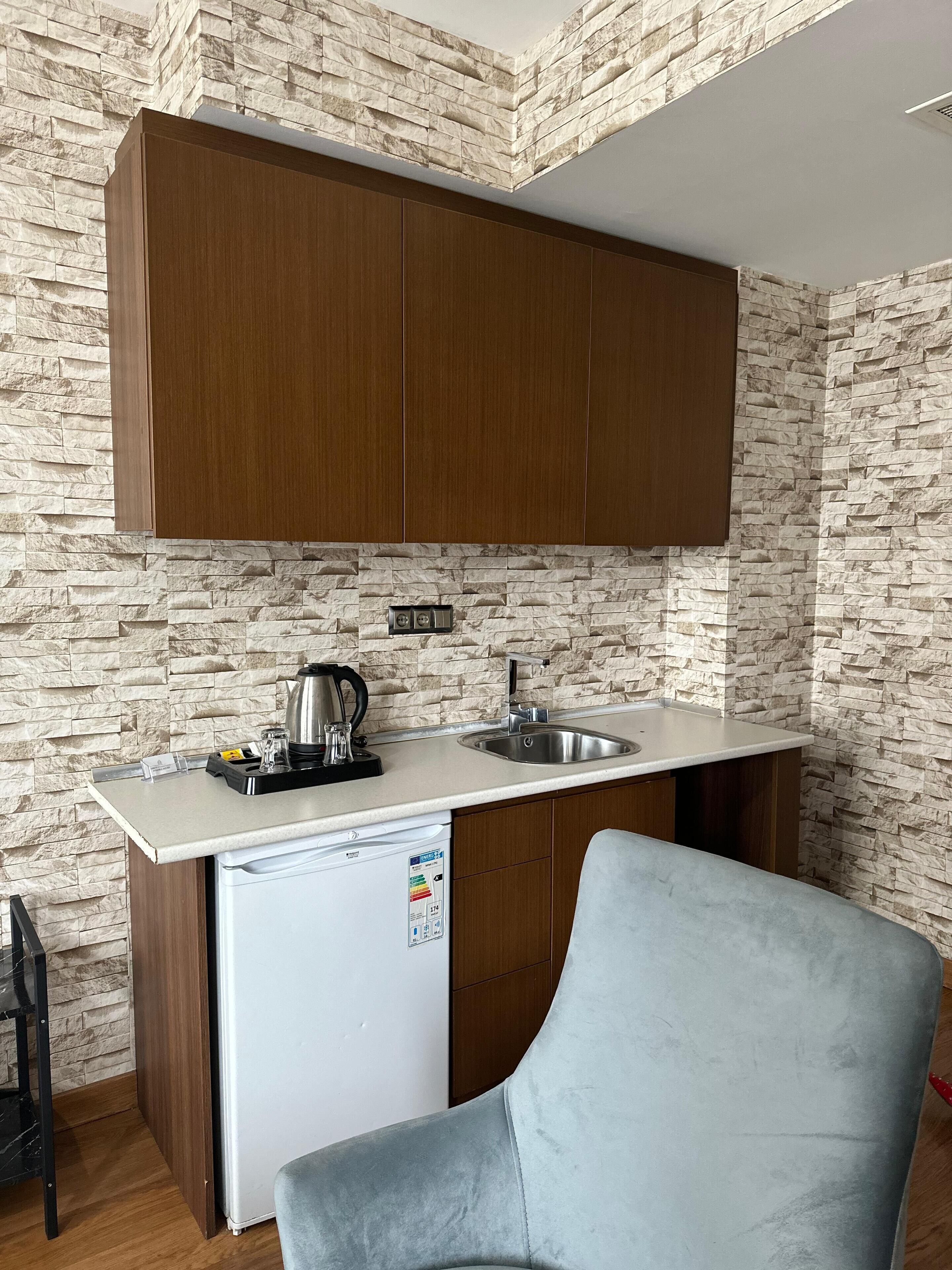 mini-fridge, cookware/dishes/utensils