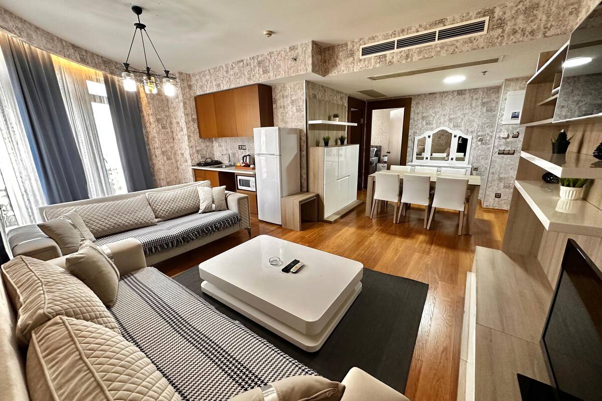 family room, multiple beds, 2 bathrooms | living area | 45-inch tv with satellite channels