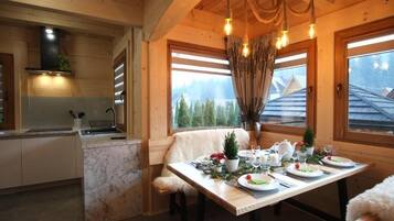 Superior Chalet | Living area | Flat-screen TV