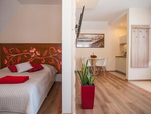 Apartemen Deluks | Area keluarga | TV layar datar