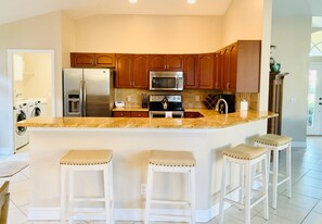 Fridge, microwave, dishwasher, coffee/tea maker