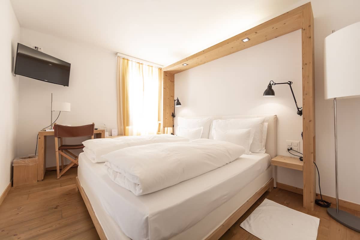 1 Schlafzimmer, hochwertige Bettwaren, Daunenbettdecken, Minibar