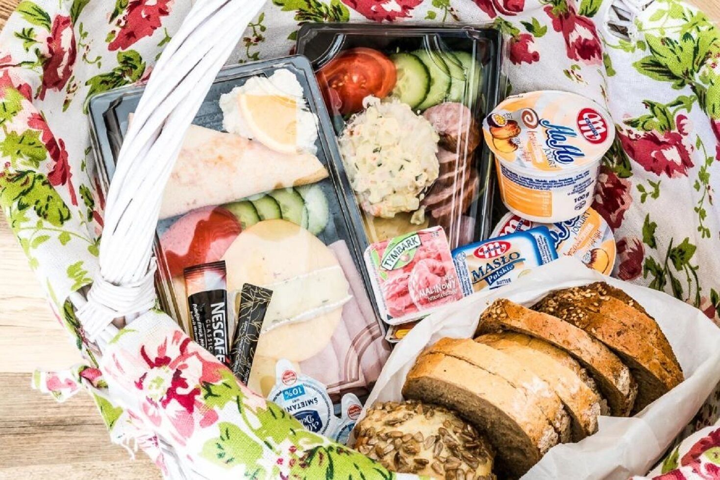 A meal kit with various food items and bread.