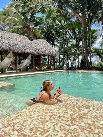 Outdoor pool, free pool cabanas, pool loungers. Catalina's Hideaway