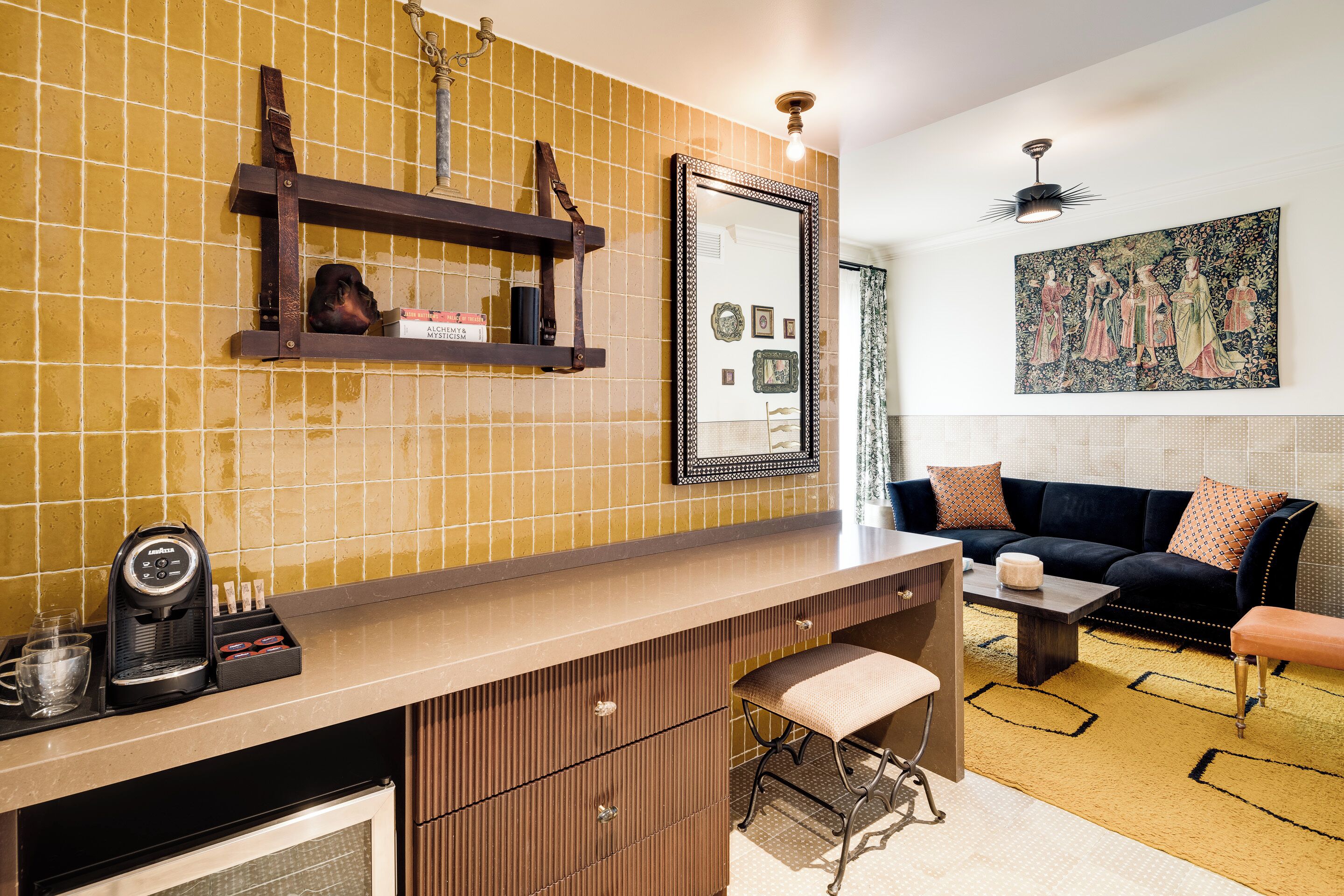 capone suite | living area | 43-inch smart tv with digital channels, tv, tablet