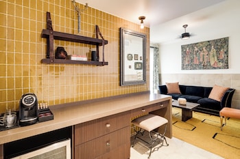 Capone Suite | Living area | 43-inch Smart TV with digital channels, TV, tablet at Esme Miami Beach