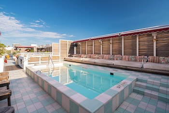 Outdoor pool, open 8:00 AM to 10:00 PM, sun loungers at Esme Miami Beach