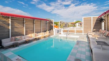 Outdoor pool, open 8:00 AM to 10:00 PM, sun loungers
