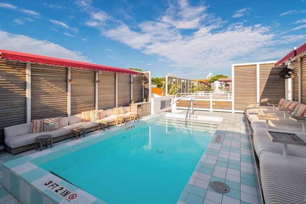 Outdoor pool, open 8:00 AM to 10:00 PM, sun loungers