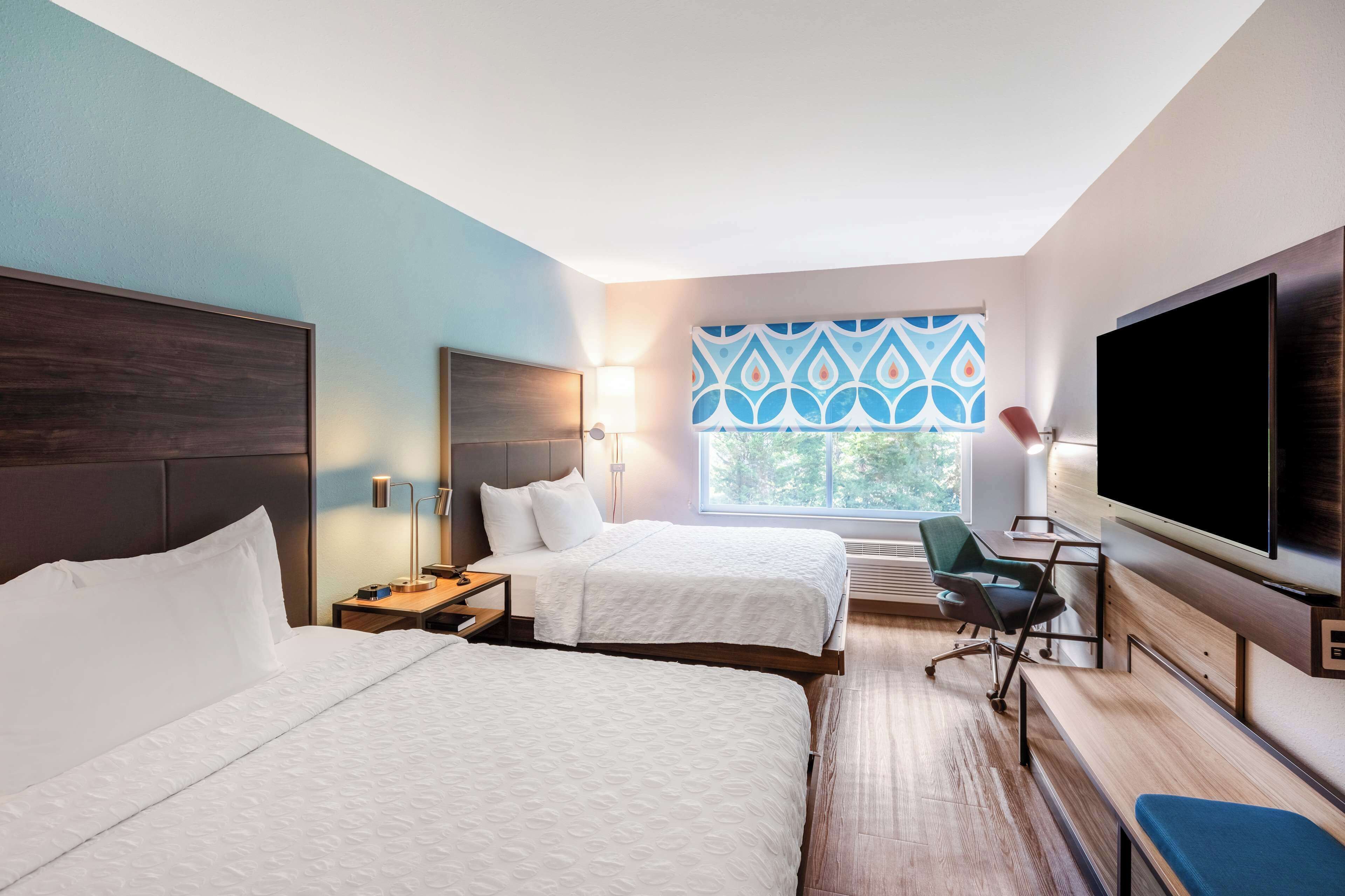 desk, laptop workspace, blackout curtains, iron/ironing board