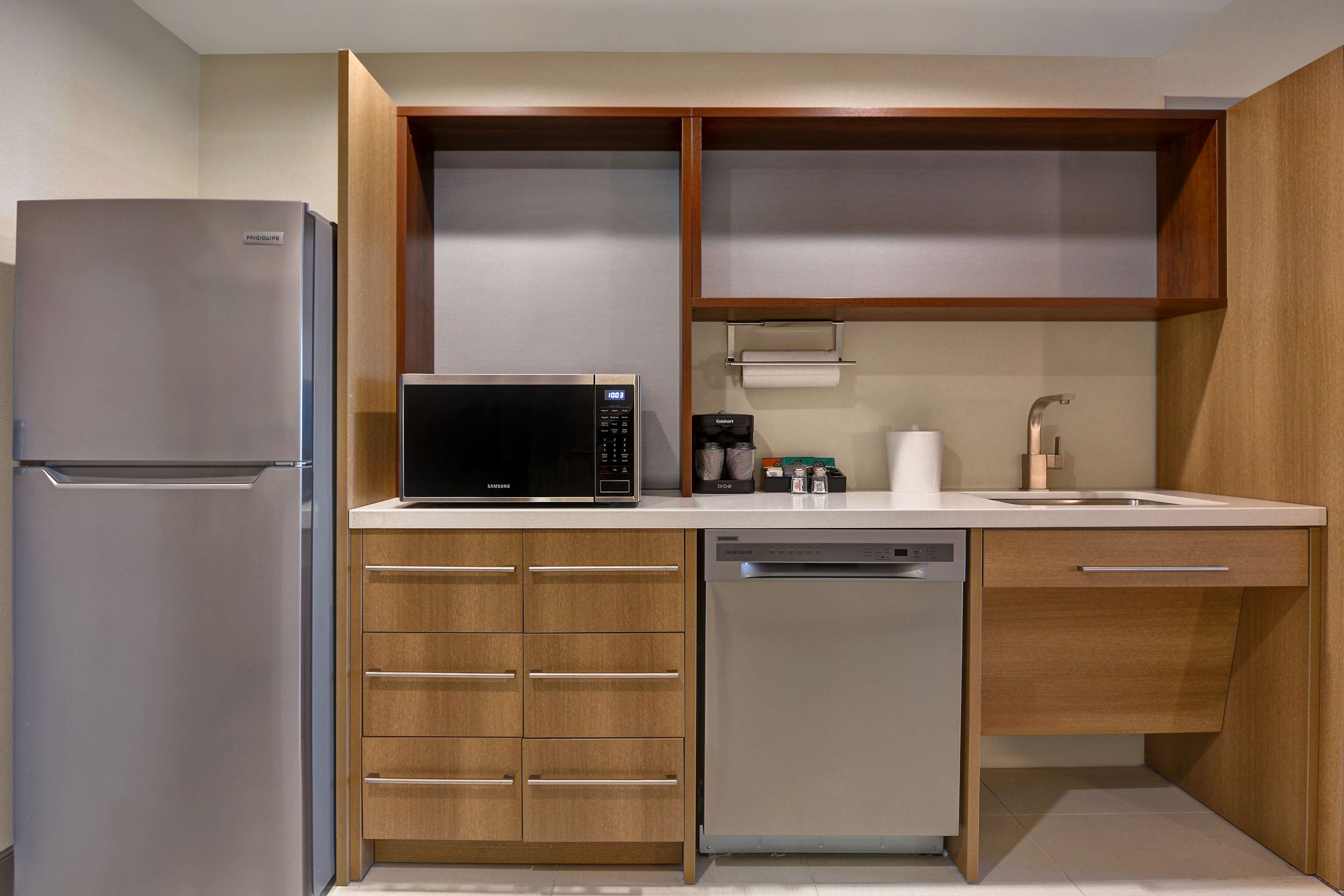 full-sized fridge, microwave, dishwasher, coffee/tea maker