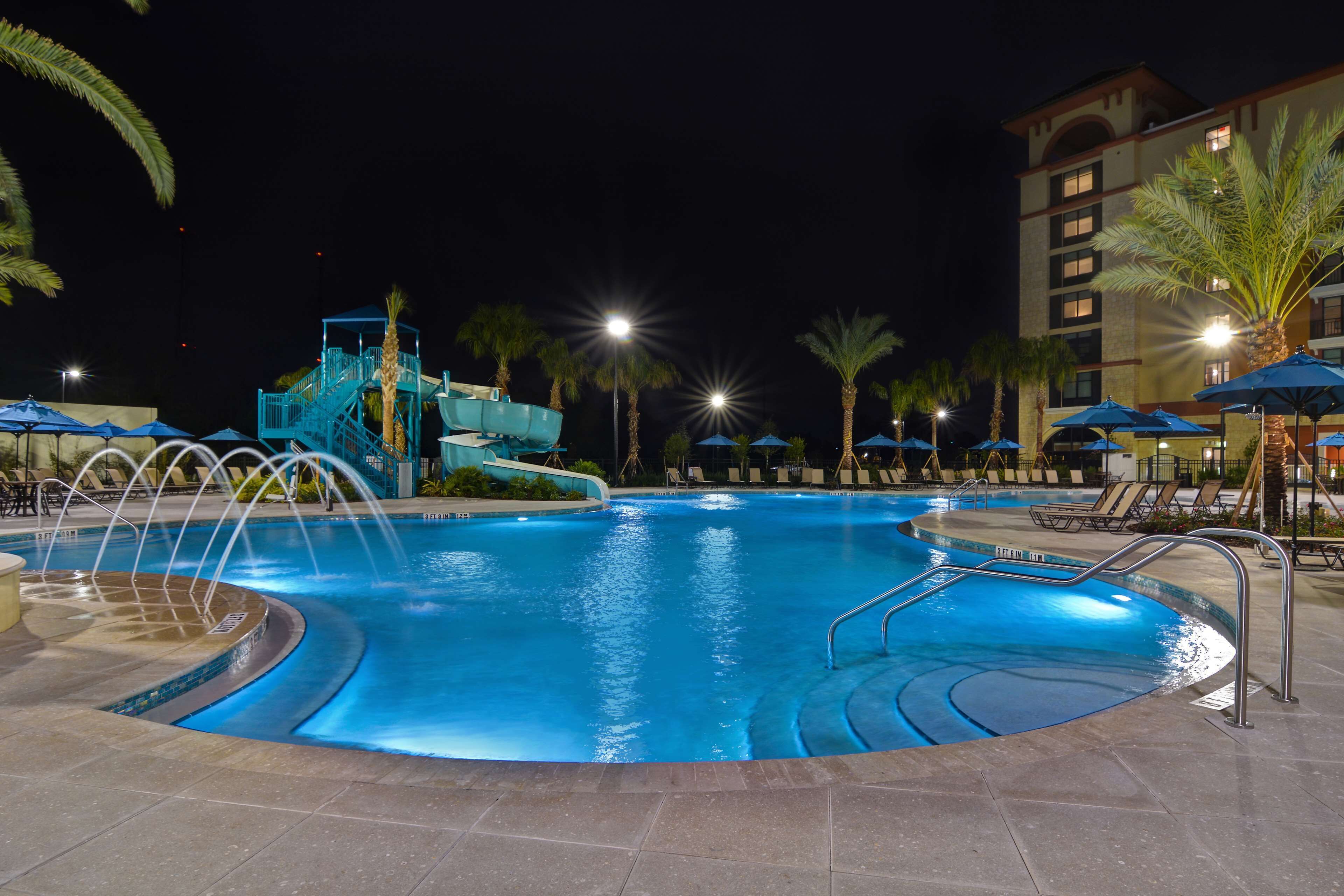 outdoor pool, open 9:00 am to 10:00 pm, pool umbrellas, pool loungers