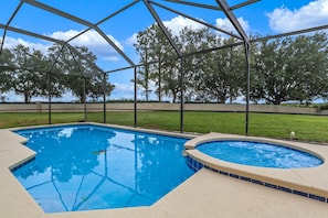 A heated pool, sun loungers
