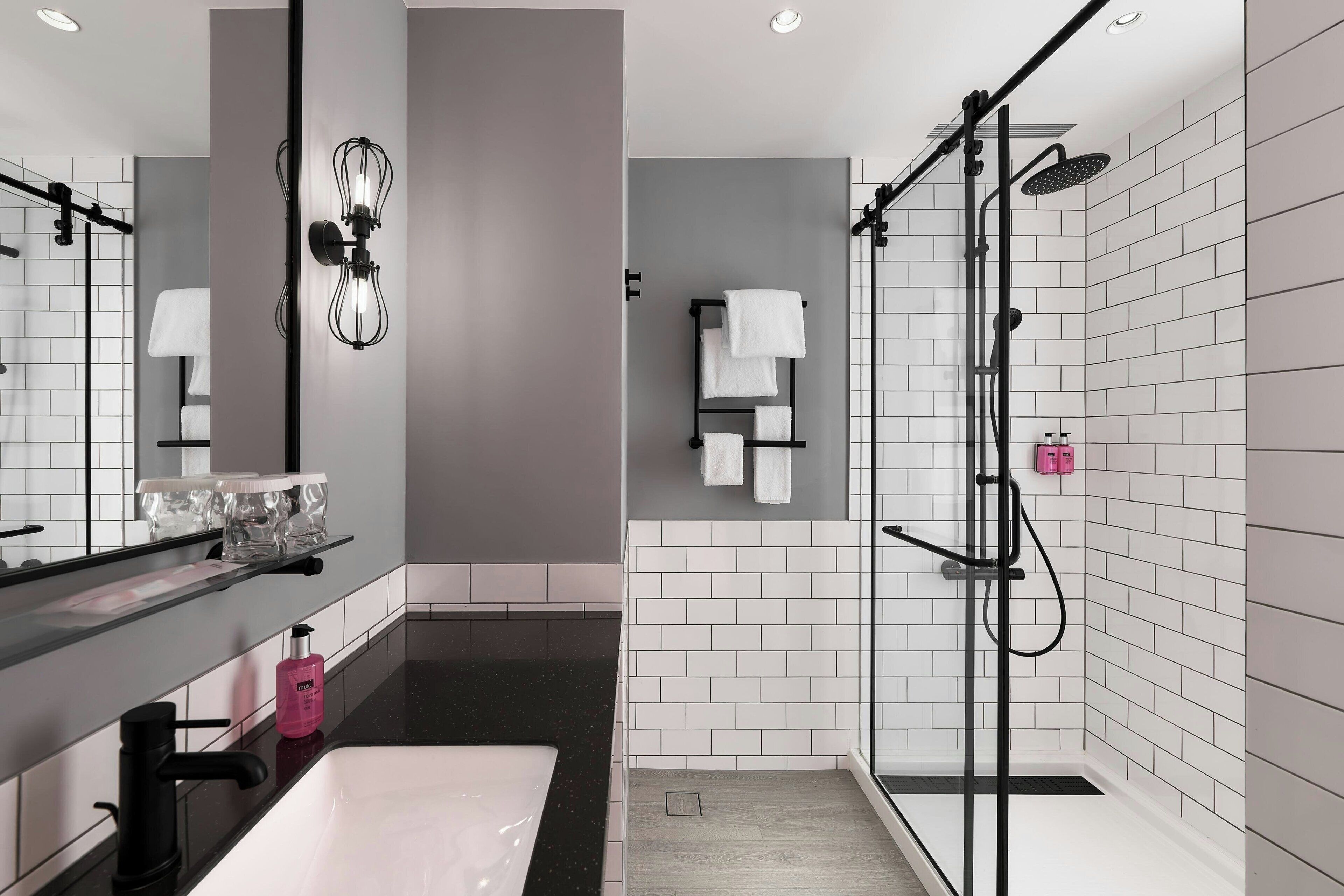 deluxe room, 1 standard double bed and 1 sofa bed | bathroom | shower, rainfall showerhead, hair dryer, bidet