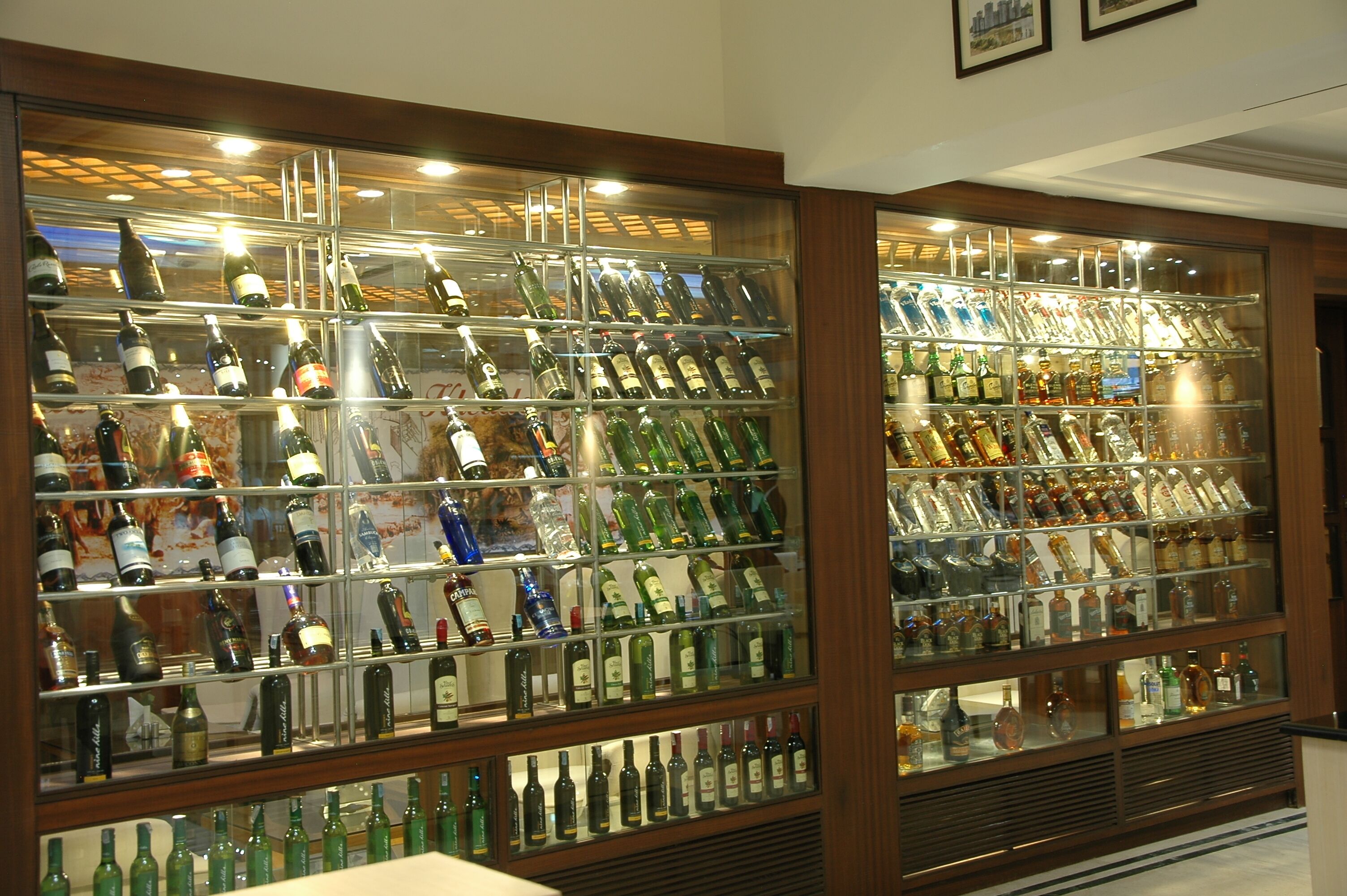 A well-lit liquor store with shelves of various bottles.