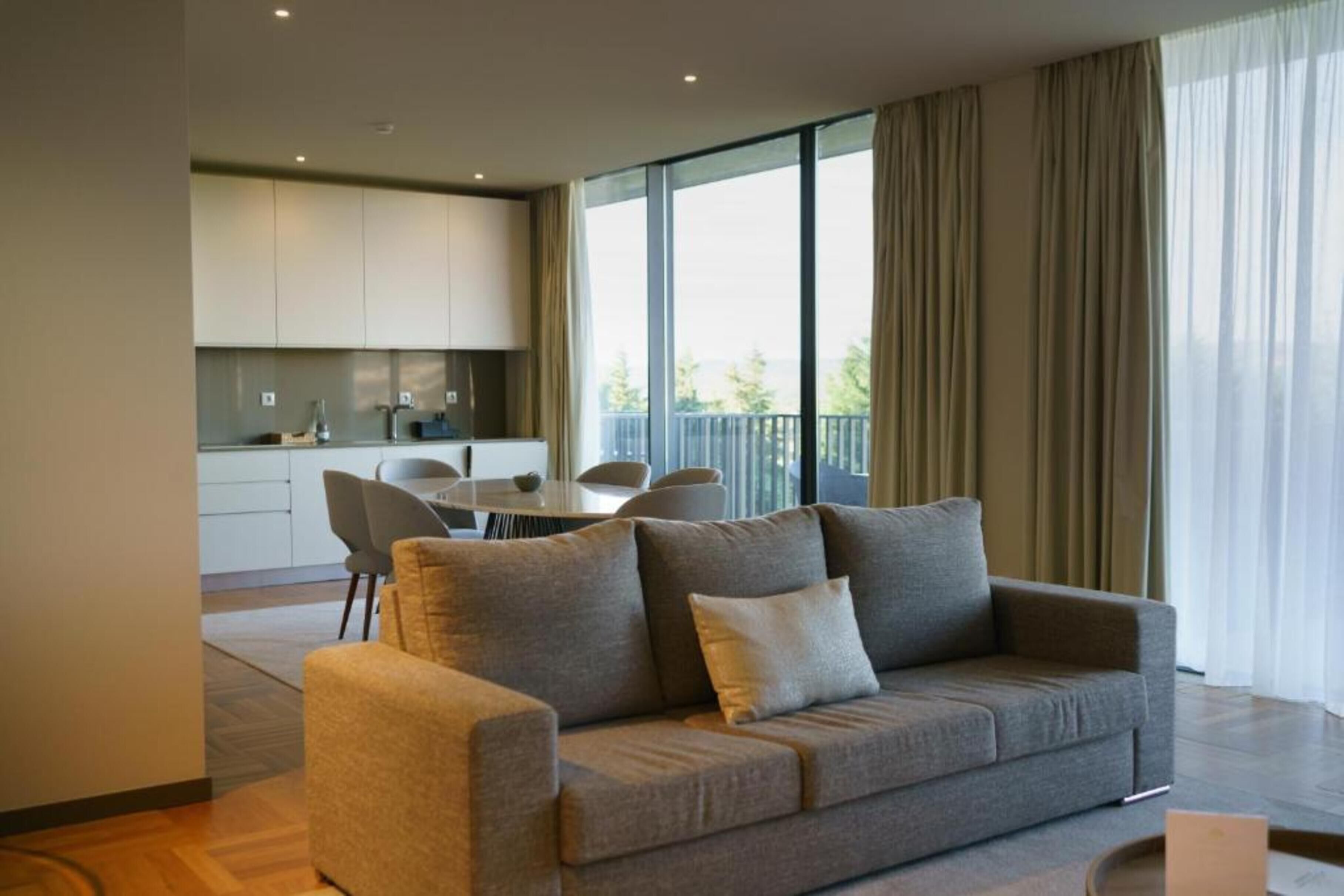 superior apartment, 3 bedrooms | living area | flat-screen tv