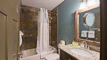 Hair dryer, towels, soap, shampoo
