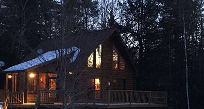 Light-Filled Log Home, 4 Wooded Acres, & Lake Access. The water is 0.4 mi away.