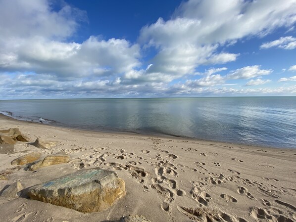 On the beach, sun loungers, beach towels