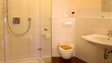 Hair dryer, soap, toilet paper