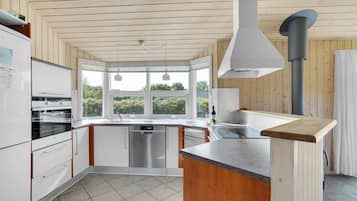 Fridge, stovetop, dishwasher, coffee/tea maker