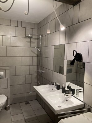 Shower, hair dryer, towels, soap