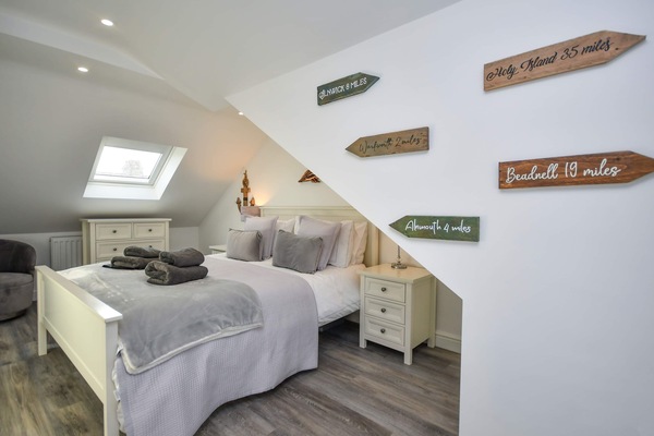 Fabulous master bedroom suite with views of the Marina