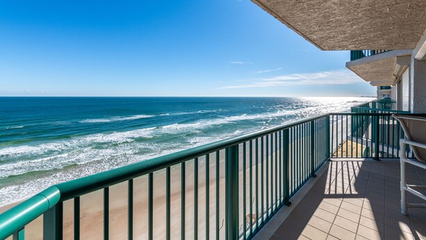 A balcony with a view of the ocean and a clear sky. - Large Luxury 2 Bedroom, 2 Bath Direct Ocean Front (Daytona Beach)
