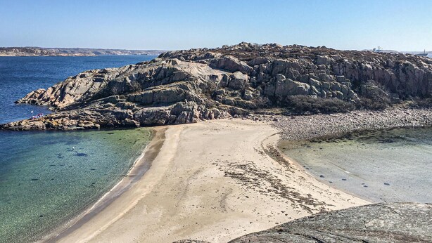 A rocky coastline with clear waters and a sandy beach. - 1 bedroom nice home in Bohus-Malmön (Bohus-Malmön)