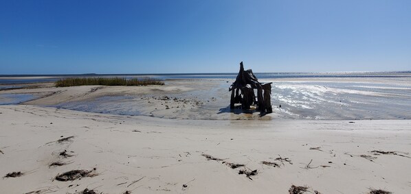 On the beach, sun loungers, beach towels