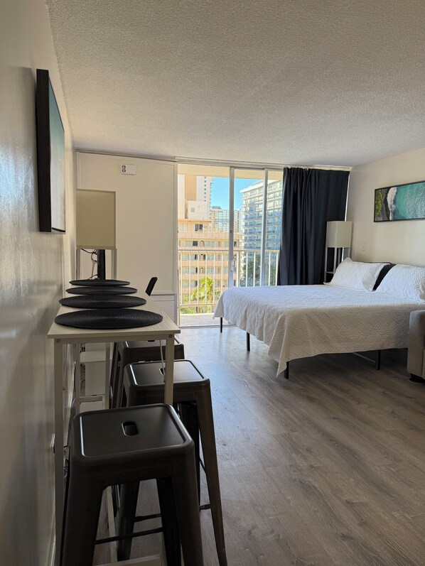 1 bedroom, desk, iron/ironing board, travel crib