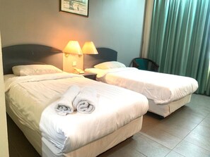 Standard Twin Room | Individually furnished, desk, laptop workspace, iron/ironing board