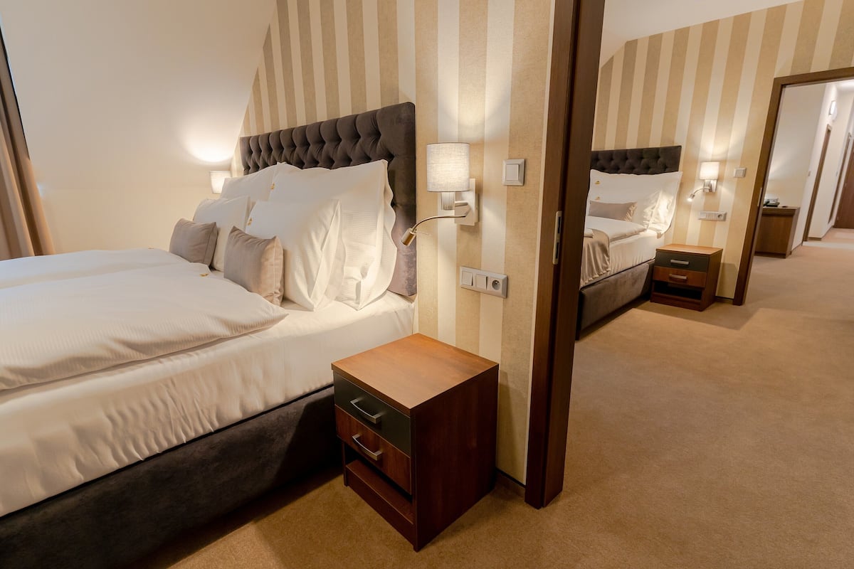 Family Suite, 2 Bedrooms | 1 bedroom, minibar, in-room safe, desk