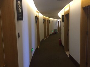 A hotel hallway with doors numbered 8320, 8318, and 8319. - Greentree Inn Beijing Tongzhou District Yujiawu Techonology Park Express Hotel (Tongzhou)