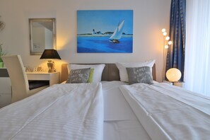 1 habitación, tabla de planchar con plancha, cuna de viaje y wifi 