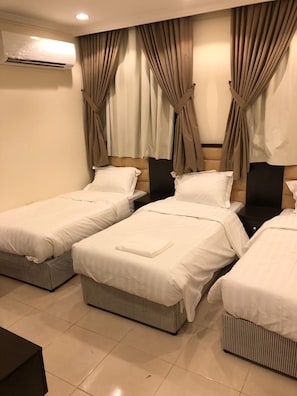 Premium-Dreibettzimmer | Zimmersafe, individuell dekoriert, individuell eingerichtet