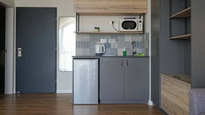 Suite, vue sur la ville | Cuisinette privée