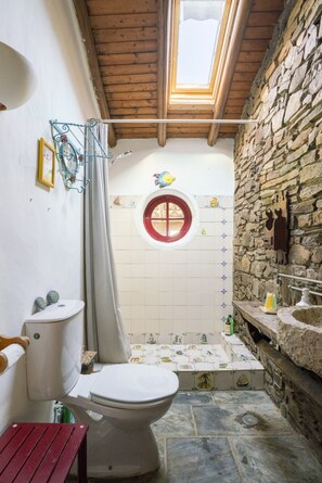Shower, towels, soap, toilet paper