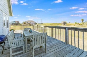 Outdoor dining - Enjoy panoramic views from the spacious wrap around deck!  (Freeport)