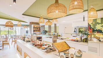 Breakfast, lunch served; local and international cuisine, garden views