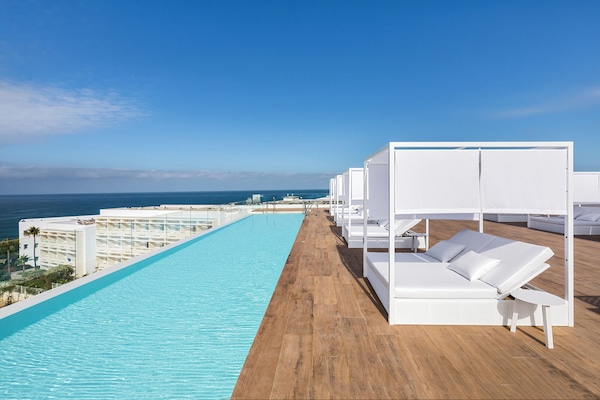 3 outdoor pools, pool umbrellas, sun loungers